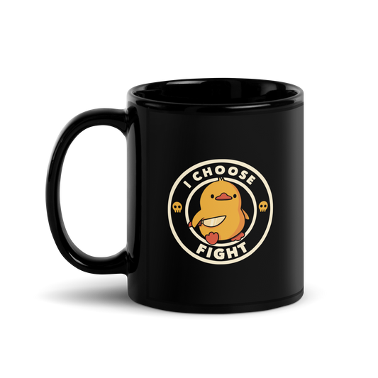 The image displays a cute, cartoon-style yellow duck character holding a knife with a determined expression. The duck is centered inside a circular design with the text 'I CHOOSE FIGHT' around it. Two small skulls flanking the duck add a humorous, combative touch to the design.
