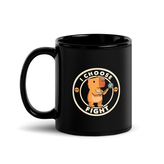 A cute, cartoon-style capybara stands upright holding a spiked mace with both hands. The image is framed by a circular border, inside of which the words 'I Choose Fight' are written in bold, playful letters. The design is accented with two small skull icons on either side, evoking a humorous take on combat readiness.