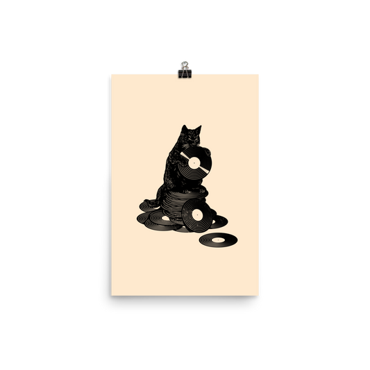 This design features a black cat cozily perched atop a stack of vinyl records, clutching one like it’s pure gold. It’s a tribute to analog lovers, feline charm, and the timeless joy of spinning a record. Perfect for music collectors, cat enthusiasts, and anyone with a nostalgic soul.