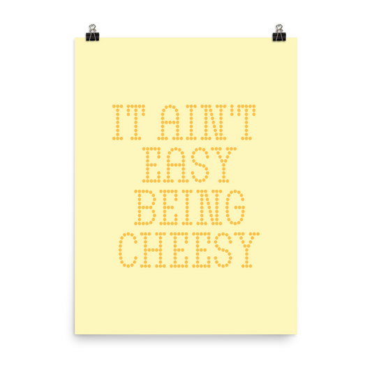 Bold dotted typography spells out ‘It Ain’t Easy Being Cheesy’ in a playful retro style on a yellow background. This funny design mixes wordplay with foodie humor, perfect for pun lovers, cheese fans, retro humor enthusiasts, and anyone who embraces the cringe with pride. A great quirky gift for cheese lovers and humor fans alike.