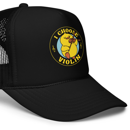 The design features a cute yellow duckling playing a violin with eyes closed in bliss. It is encircled by the phrase 'I Choose Violin' with musical notes on either side. The style is playful and cartoony, giving a warm, humorous vibe.