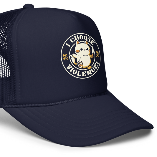 The image features a cute, cartoon-style cat holding a knife in one hand, while standing with an assertive expression. The phrase 'I CHOOSE VIOLENCE!' surrounds the cat in a circular layout. Two small cat skull and crossbones illustrations flank either side of the cat. The design combines elements of cuteness and aggression, creating a humorous and ironic vibe.