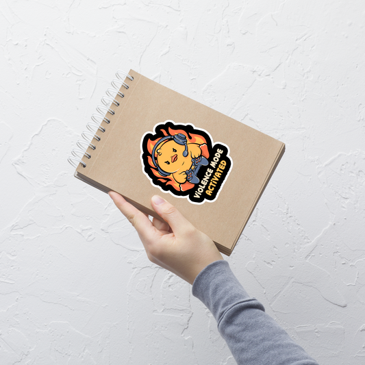 A determined duck, with flames behind it, wearing a gaming headset and holding a controller with intense focus. This design captures the humorous intensity of going full "violence mode" during competitive matches. Perfect for gamers, streamers, and fans of bold and fun geek designs.