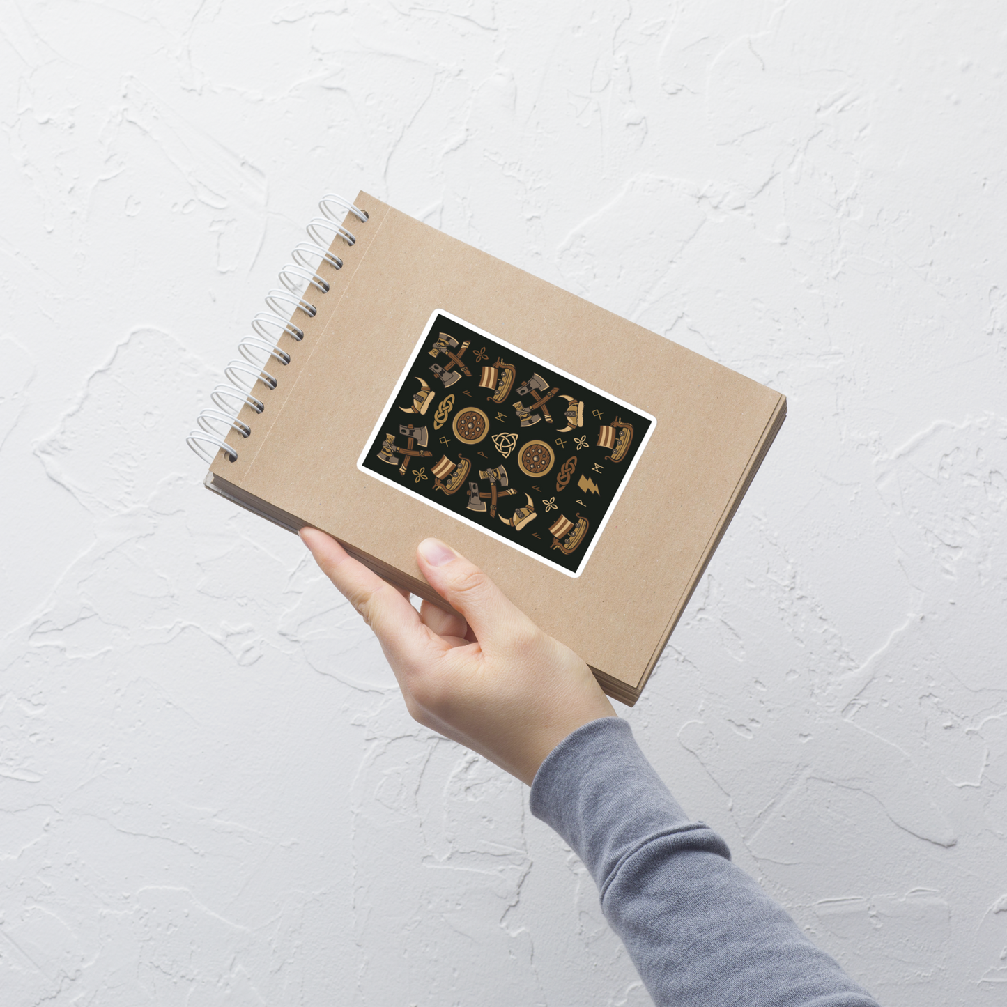 The artwork features a symmetrical illustration with axes, wooden shields, Viking helmets, longships, and runes in earthy tones on a dark background. Each element reinforces the classic Nordic aesthetic, blending iconic symbols with a detailed and super harmonious cartoon style. Perfect for fans of Viking culture, Norse mythology, RPGs, and anyone who loves prints with an epic and stylized vibe