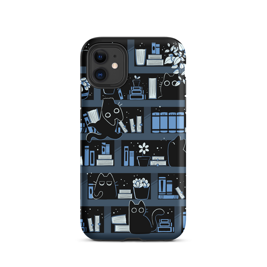 A pattern designed to resemble one large bookshelf filled with books, plants and playful little black kittens tucked between the shelves. An artwork in shades of black and blue, perfect for those who love cats, books and plants.