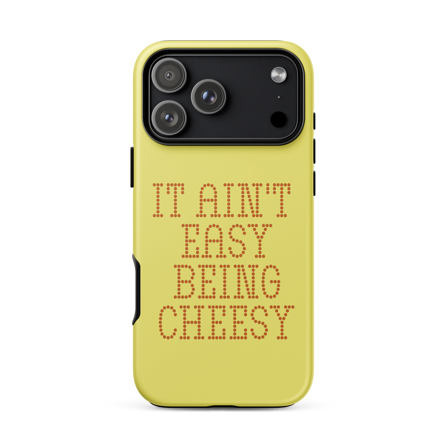 Bold dotted typography spells out ‘It Ain’t Easy Being Cheesy’ in a playful retro style on a yellow background. This funny design mixes wordplay with foodie humor, perfect for pun lovers, cheese fans, retro humor enthusiasts, and anyone who embraces the cringe with pride. A great quirky gift for cheese lovers and humor fans alike.