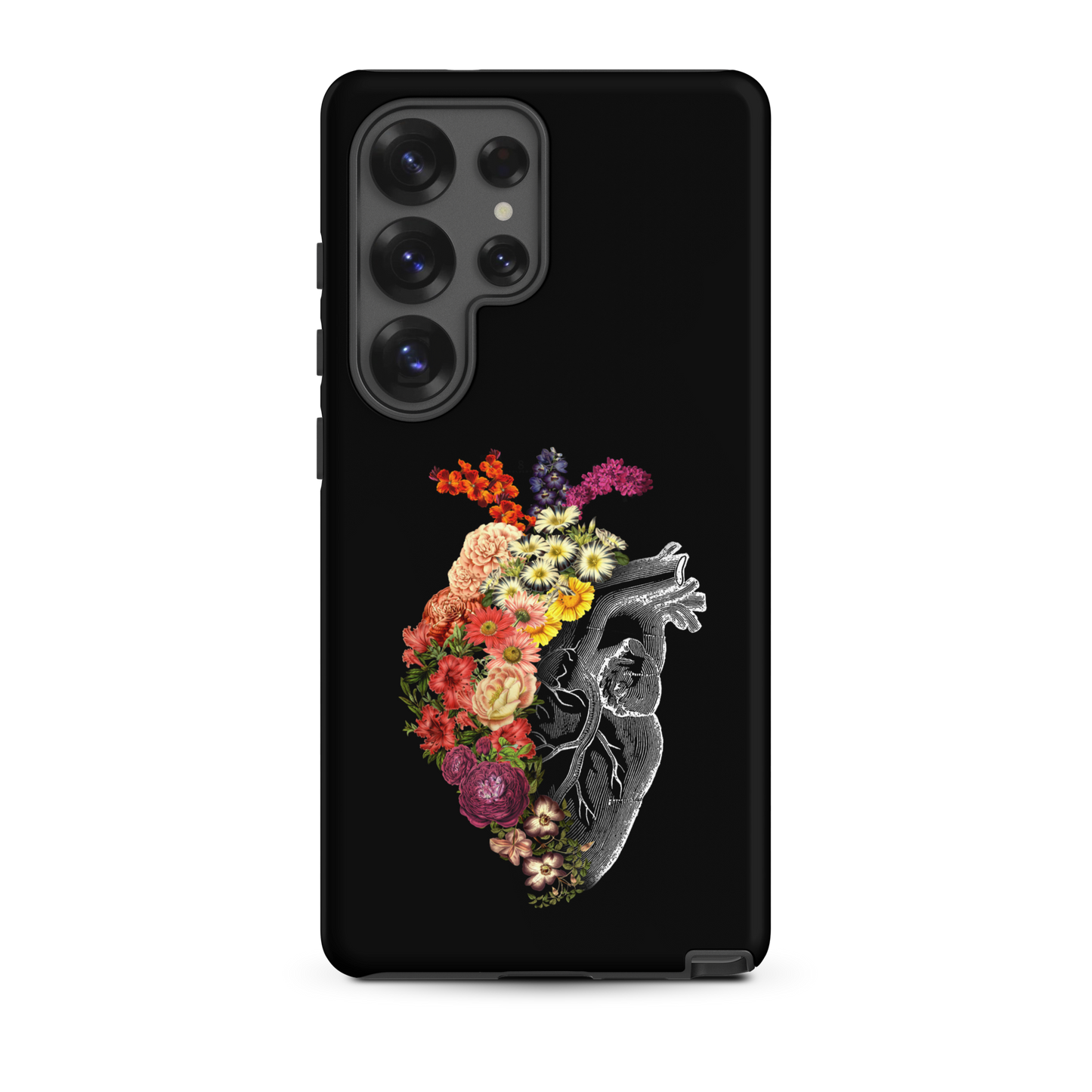 The design is an intricate and anatomical drawing of a human heart on a black background. The left side of the heart morphs into a vibrant assortment of colorful flowers, including roses, daisies, and other blooming blossoms, creating a striking contrast between the realistic and the surreal, symbolizing the harmony between nature and humanity.