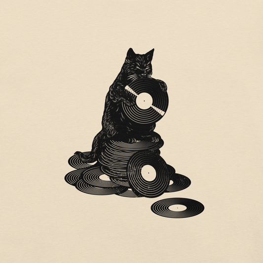 This design features a black cat cozily perched atop a stack of vinyl records, clutching one like it’s pure gold. It’s a tribute to analog lovers, feline charm, and the timeless joy of spinning a record. Perfect for music collectors, cat enthusiasts, and anyone with a nostalgic soul.