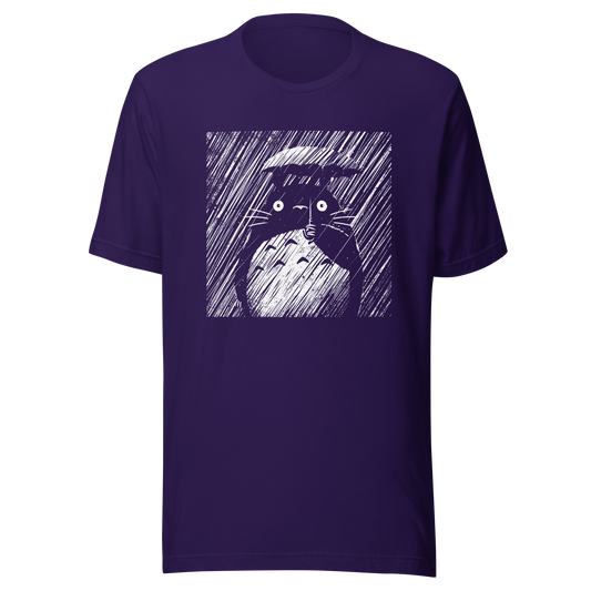 A large forest spirit stands still in the rain, holding a tiny umbrella while soaking in the storm. This black and white design captures a quiet, emotional moment with a vintage, textured style.