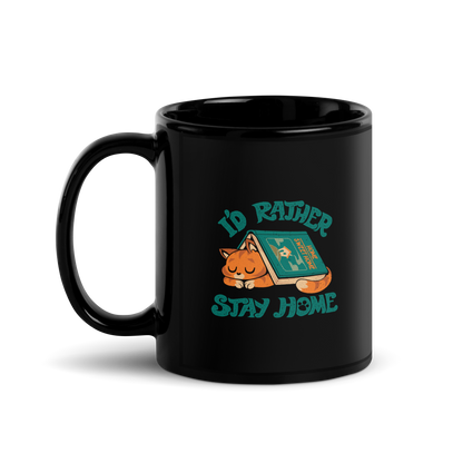 Sleeping orange cat under a book labeled 'Home Sweet Home' with the motto 'I'D RATHER STAY HOME'.