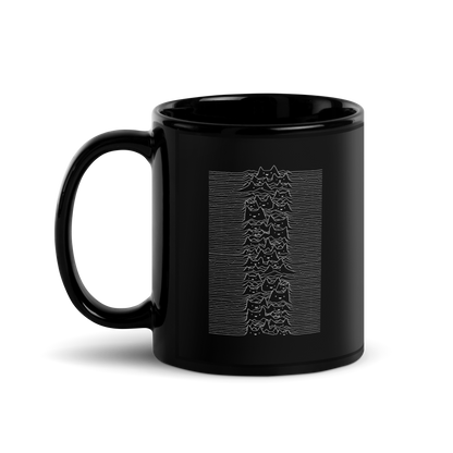 The drawing is a series of continuous wavy lines forming a pattern reminiscent of sound waves or topographic maps, but with an unexpected twist: the lines create the shapes of numerous cat faces stacked vertically. Each cat has simple, expressive features with pointed ears, adding a whimsical element to the otherwise structured pattern.