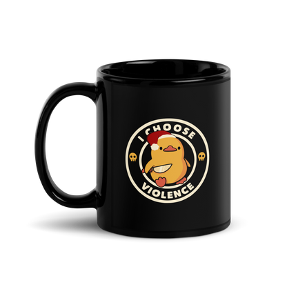 The image depicts a cute, cartoon-style yellow duckling wearing a Santa hat, holding a knife. It is encircled by the phrase 'I CHOOSE VIOLENCE' with small skull icons on either side of the ring. The overall tone is humorous and ironic, combining the traditionally non-violent image of a duckling with the aggressive message. The style is playful, with a mix of Christmas elements and dark humor.