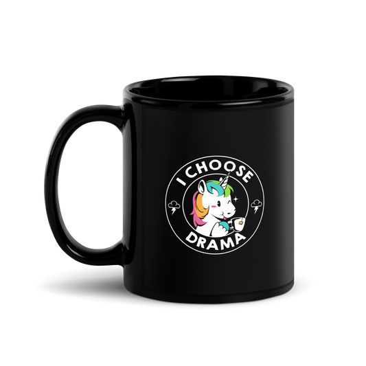 A cartoon unicorn with rainbow-colored mane holds a cup of tea and a heart, encircled by the words 'I Choose Drama'. Two small clouds with lightning bolts flank the unicorn, adding a playful yet slightly edgy vibe. The design is bold and whimsical with a pop-art influence.