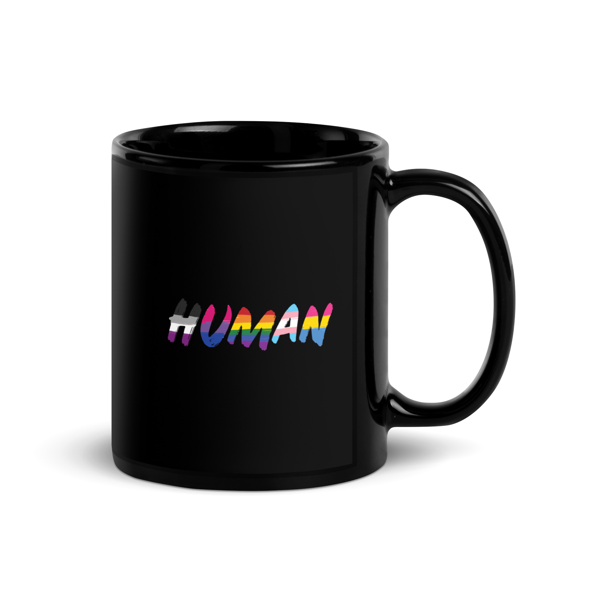 The image displays the word 'HUMAN' in bold, capitalized letters filled with colorful pride flag patterns. The colors within the letters represent different LGBTQ+ pride flags, symbolizing inclusivity and diversity. The background is solid black, which makes the colorful patterns stand out more vibrantly.