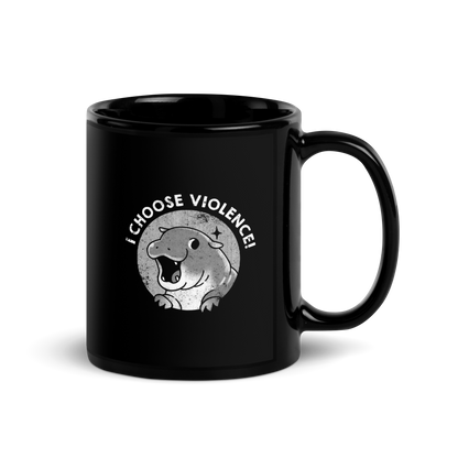 The image features a cartoonish illustration of a happy, open-mouthed hippo with paws raised, set within a circular design. Above it, bold text reads 'I CHOOSE VIOLENCE!' The design is monochrome with a textured, retro print style, suggesting a playful yet ironic tone.
