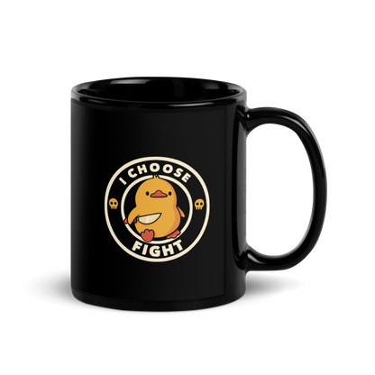 The image displays a cute, cartoon-style yellow duck character holding a knife with a determined expression. The duck is centered inside a circular design with the text 'I CHOOSE FIGHT' around it. Two small skulls flanking the duck add a humorous, combative touch to the design.