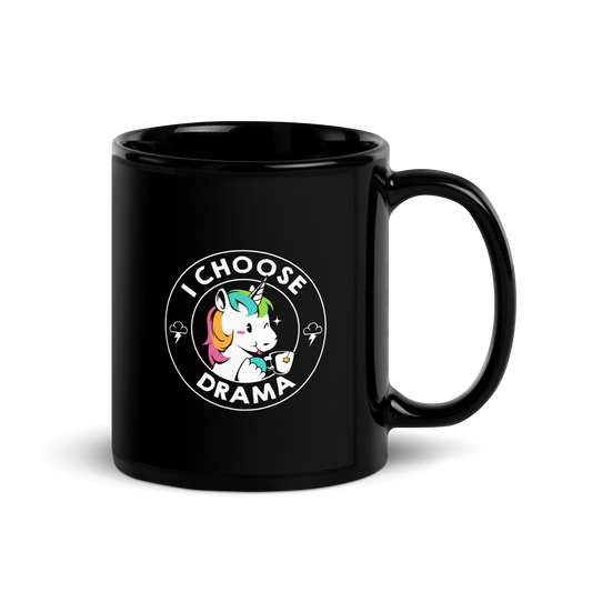 A cartoon unicorn with rainbow-colored mane holds a cup of tea and a heart, encircled by the words 'I Choose Drama'. Two small clouds with lightning bolts flank the unicorn, adding a playful yet slightly edgy vibe. The design is bold and whimsical with a pop-art influence.