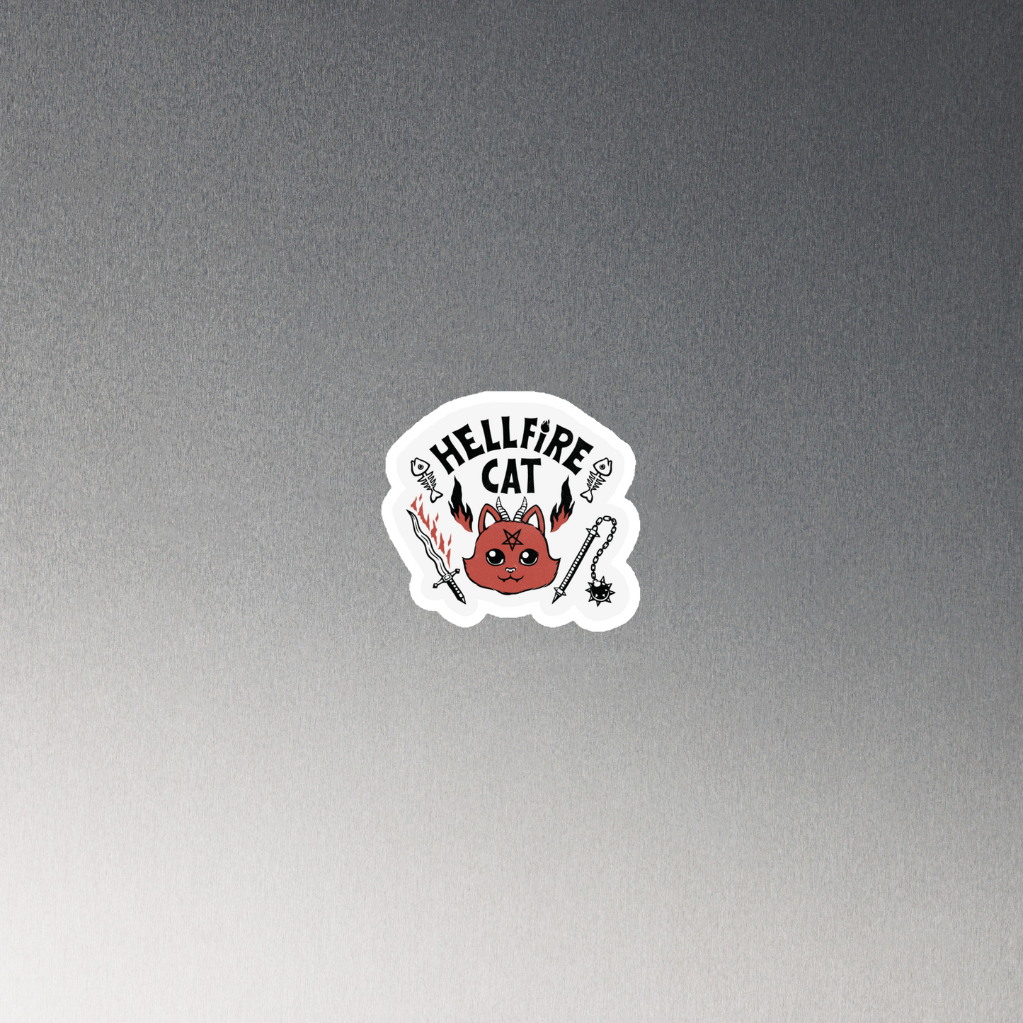 Vintage-style illustration of a cute red devil cat with small horns and a pentagram on its forehead, surrounded by flames, weapons, fish skeletons, and the bold phrase “Hellfire Cat” in a playful gothic design.