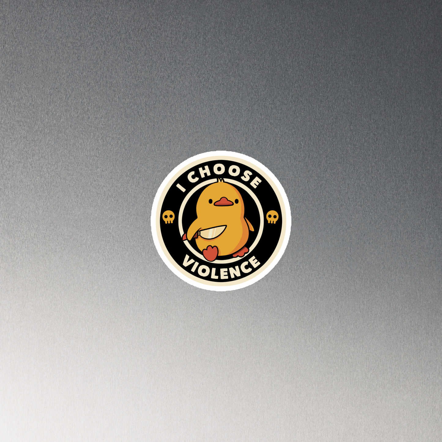 A cute, cartoon-style yellow duckling stands confidently holding a large knife in its wing. The duckling is encircled by text saying 'I CHOOSE VIOLENCE' in bold white letters. Small skull symbols flank the chick on either side, adding a touch of humor and irony to the otherwise adorable drawing.