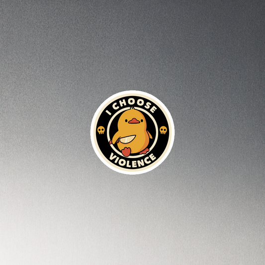 A cute, cartoon-style yellow duckling stands confidently holding a large knife in its wing. The duckling is encircled by text saying 'I CHOOSE VIOLENCE' in bold white letters. Small skull symbols flank the chick on either side, adding a touch of humor and irony to the otherwise adorable drawing.