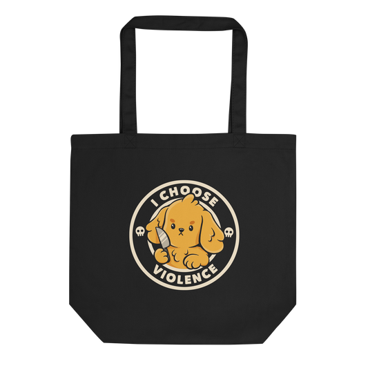 A cute yellow cartoon dog holds a small knife, surrounded by a circular logo that reads 'I Choose Violence'. The dog's expression is serious, yet the overall style is playful and cute. Two small skull icons are on either side, adding an ironic tone to the cheerful design.