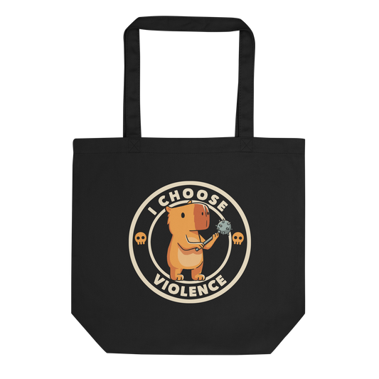 A cute, cartoonish burnt yellow capybara stands holding a spiked mace with a determined expression. Surrounding it is a circular design with the text 'I CHOOSE VIOLENCE' and two small skulls on either side, giving it a humorous yet ironic tone.