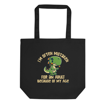 Cute cartoon dinosaur standing with a funny expression, accompanied by the humorous phrase “I’m Often Mistaken for an Adult Because of My Age” in bold distressed lettering.