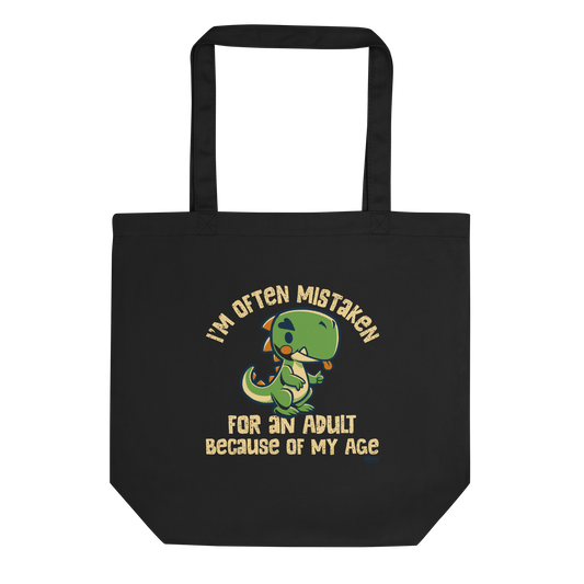 Cute cartoon dinosaur standing with a funny expression, accompanied by the humorous phrase “I’m Often Mistaken for an Adult Because of My Age” in bold distressed lettering.