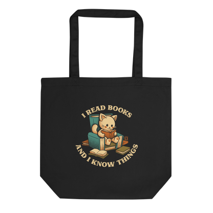 An adorable cat is sitting on a stack of books encircled by the sentence "I READ BOOKS AND I KNOW THINGS". Perfect for book lovers, this design combines wit and cuteness, making it a great choice for those who love reading and cats.