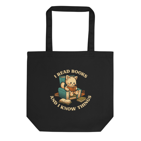 An adorable cat is sitting on a stack of books encircled by the sentence "I READ BOOKS AND I KNOW THINGS". Perfect for book lovers, this design combines wit and cuteness, making it a great choice for those who love reading and cats.