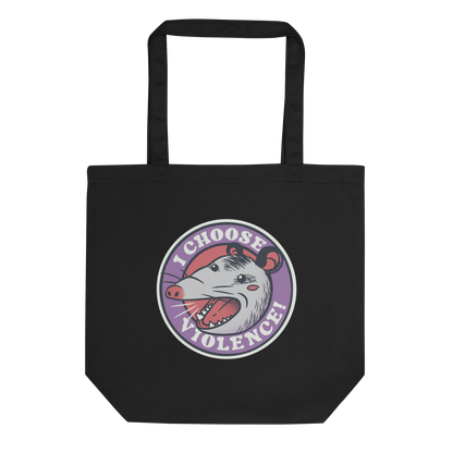 A circular design featuring an opossum with an open mouth showing sharp teeth, set against a red and purple background. Surrounding the animal, the text reads 'I Choose Violence!' in bold, white letters. The opossum has a somewhat comical yet aggressive expression. The design has an edgy, cartoon-like style, suitable for various products like t-shirts and stickers.