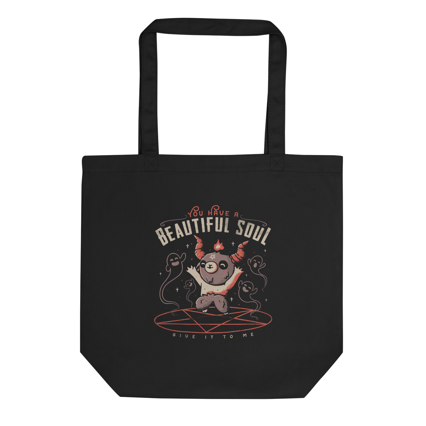 This design features a cute, cartoonish character with horns and a pentagram on its forehead, standing on a red circle with ghost-like figures surrounding it. Above the character, the text reads 'You have a beautiful soul,' and below, 'Give it to me.' The design contrasts dark and cute imagery with playful lettering.