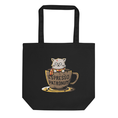 This design features an adorable cartoon cat with glasses and a lightning-shaped scar, wearing a striped scarf, sitting inside a large coffee cup. The cup has the humorous phrase 'Espresso Patronum' printed on it. The overall style is whimsical and playful, blending cute and nerdy elements. The cat appears to be a parody of a popular fictional character associated with magic and wizardry.