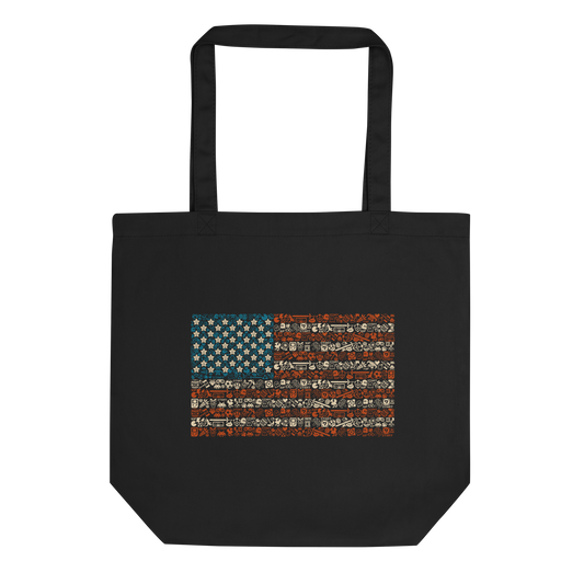 American flag illustration made entirely of retro video game icons, controllers, characters, and symbols in blue, red, and beige, arranged to form the stars and stripes.