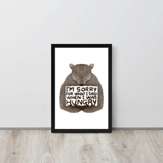 The image shows a humorous, detailed illustration of a bear, drawn in a hand-drawn style, holding a sign that reads 'I'm sorry for what I said when I was hungry.' The bear appears to be apologizing in a comical, endearing manner, making it a relatable and light-hearted design.