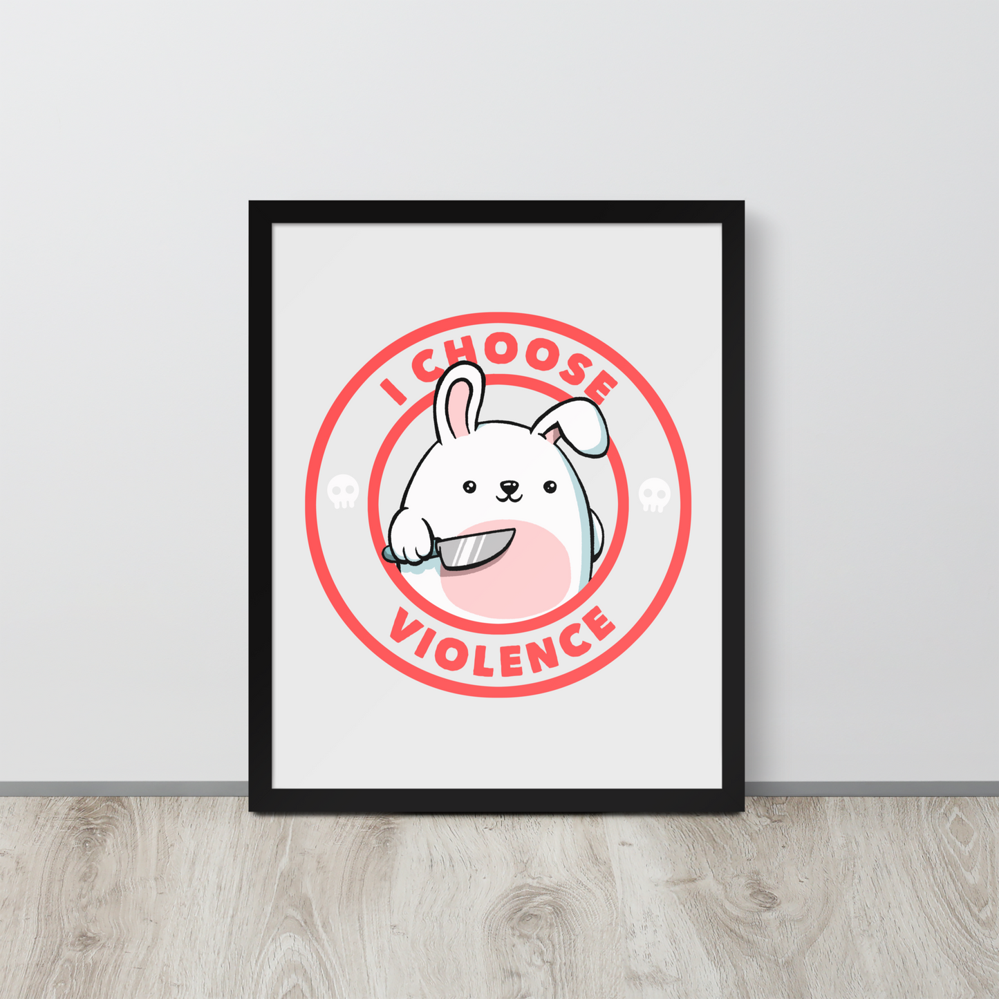 A cute white cartoon bunny with a pink belly stands holding a large kitchen knife in one paw. Surrounding the bunny is a red circular border with the words 'I CHOOSE VIOLENCE'. Small skull icons are on either side of the circle. The overall tone is a mix of adorable and ironic humor.