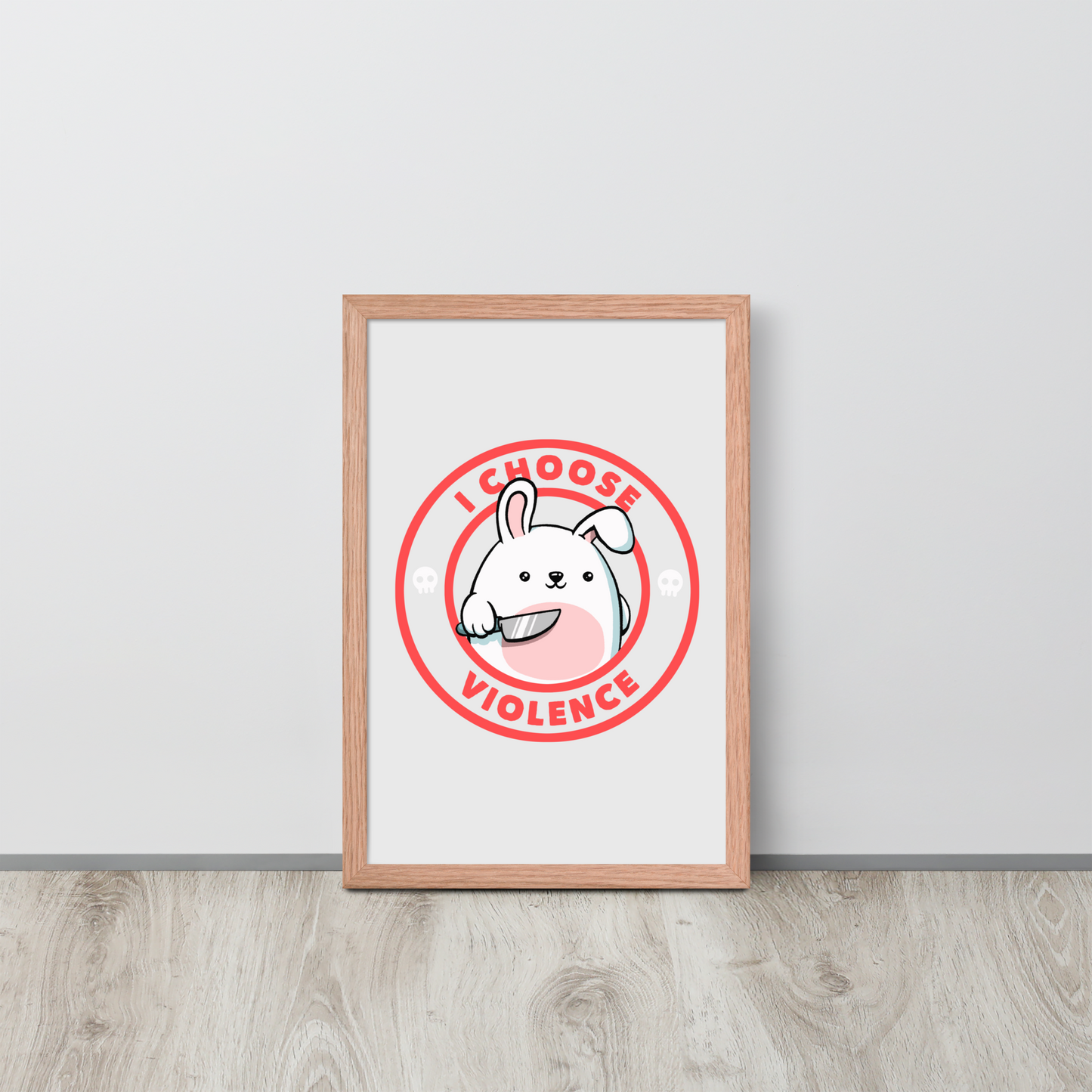 A cute white cartoon bunny with a pink belly stands holding a large kitchen knife in one paw. Surrounding the bunny is a red circular border with the words 'I CHOOSE VIOLENCE'. Small skull icons are on either side of the circle. The overall tone is a mix of adorable and ironic humor.