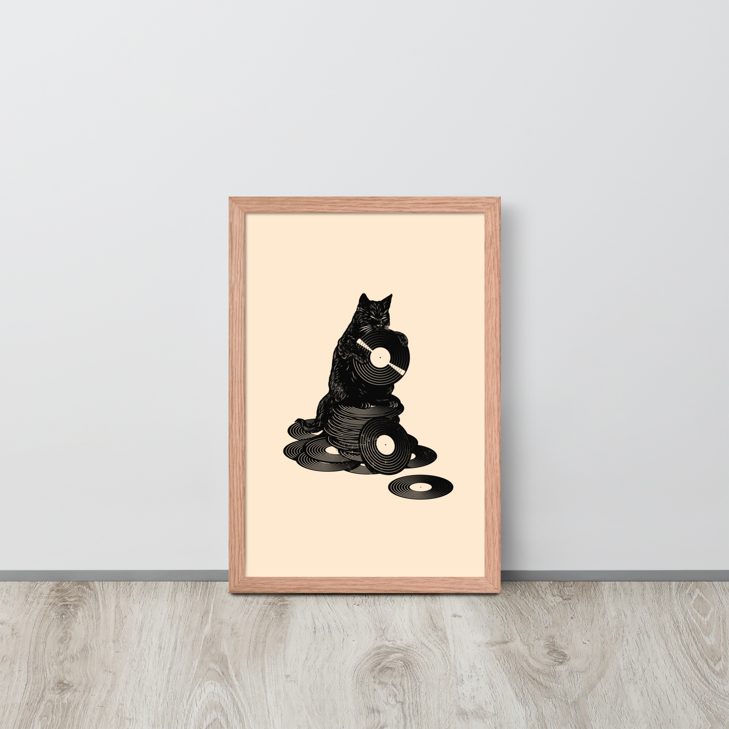 This design features a black cat cozily perched atop a stack of vinyl records, clutching one like it’s pure gold. It’s a tribute to analog lovers, feline charm, and the timeless joy of spinning a record. Perfect for music collectors, cat enthusiasts, and anyone with a nostalgic soul.