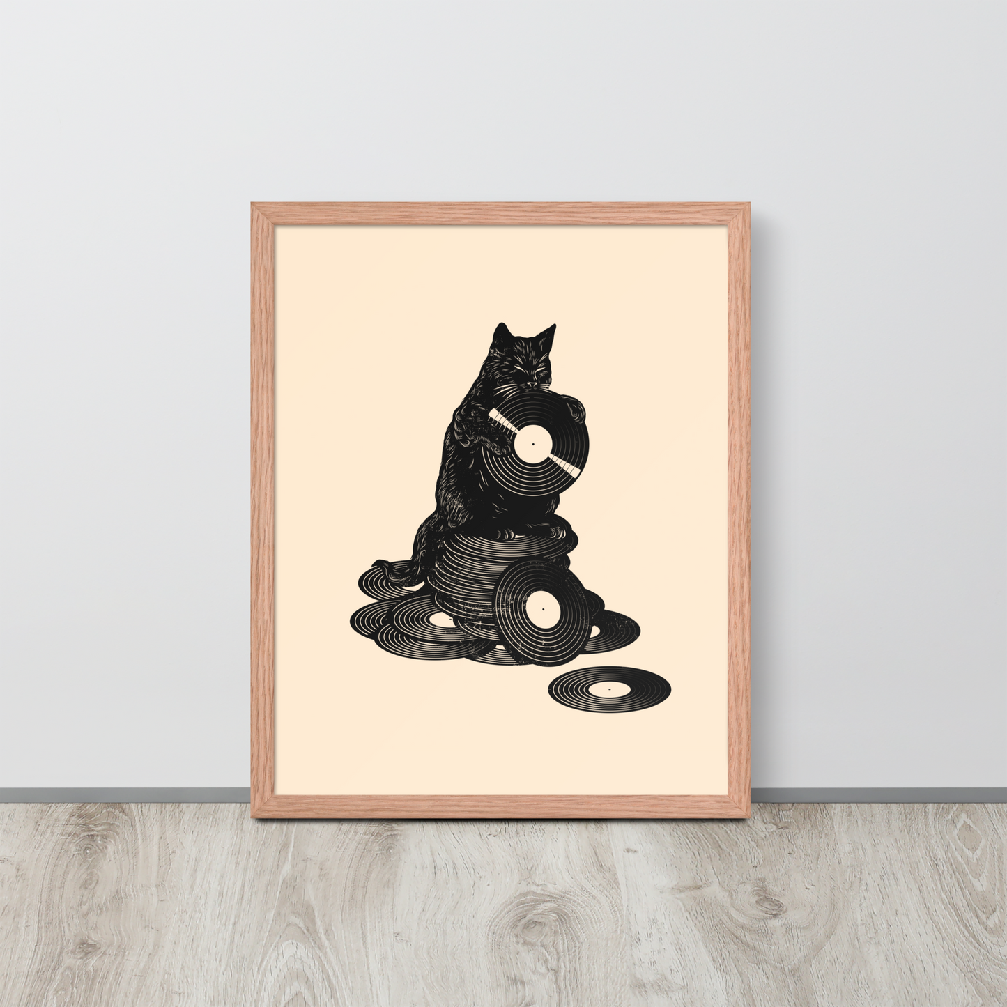 This design features a black cat cozily perched atop a stack of vinyl records, clutching one like it’s pure gold. It’s a tribute to analog lovers, feline charm, and the timeless joy of spinning a record. Perfect for music collectors, cat enthusiasts, and anyone with a nostalgic soul.