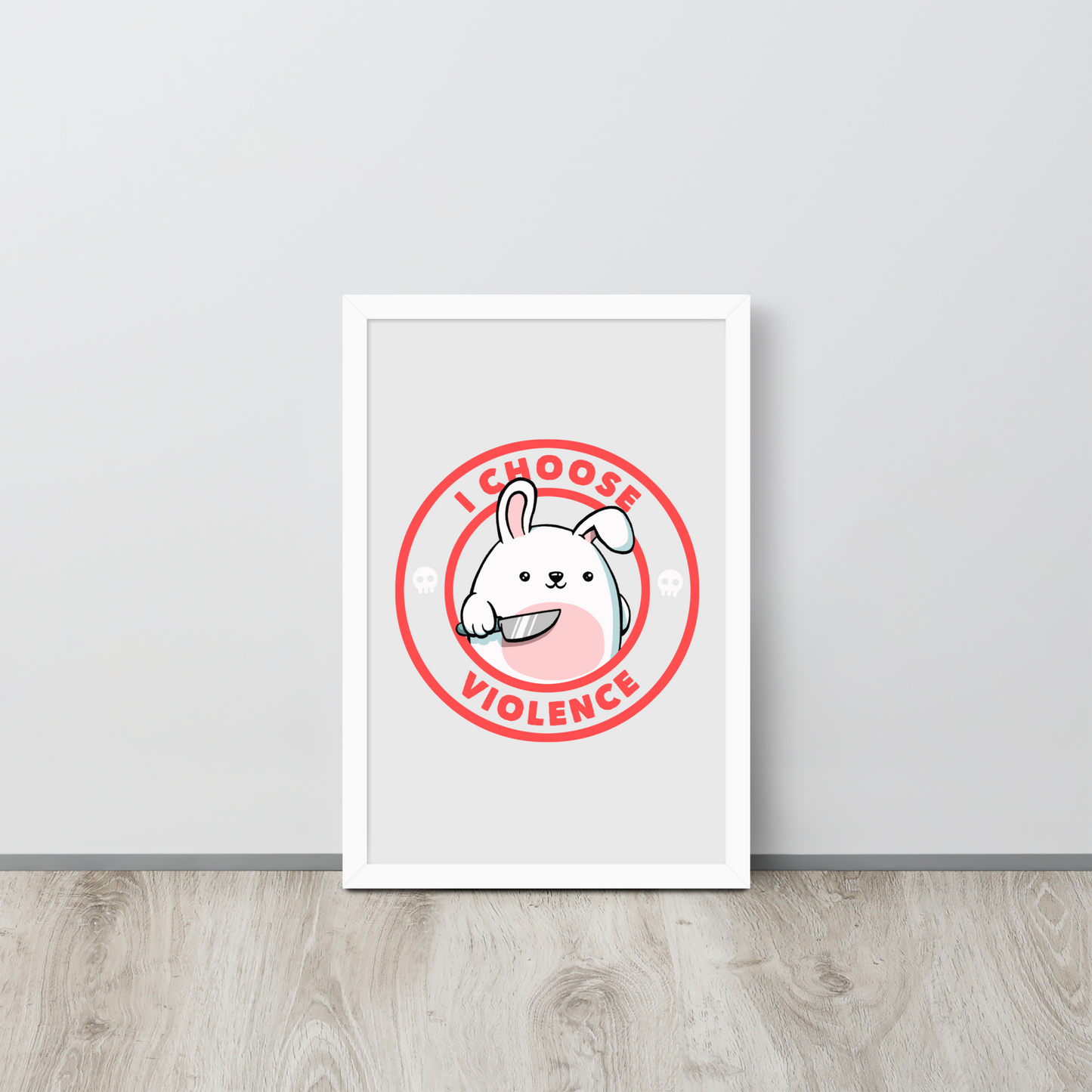 A cute white cartoon bunny with a pink belly stands holding a large kitchen knife in one paw. Surrounding the bunny is a red circular border with the words 'I CHOOSE VIOLENCE'. Small skull icons are on either side of the circle. The overall tone is a mix of adorable and ironic humor.