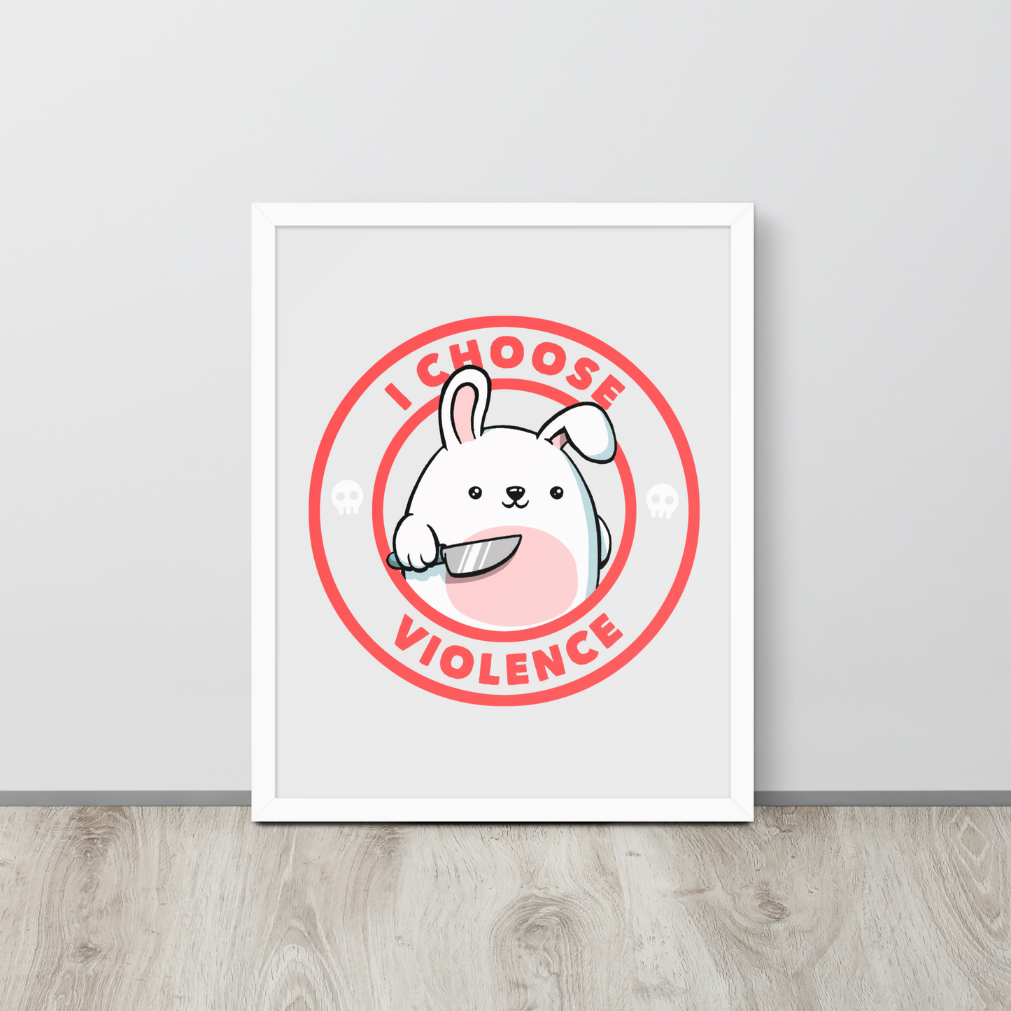 A cute white cartoon bunny with a pink belly stands holding a large kitchen knife in one paw. Surrounding the bunny is a red circular border with the words 'I CHOOSE VIOLENCE'. Small skull icons are on either side of the circle. The overall tone is a mix of adorable and ironic humor.
