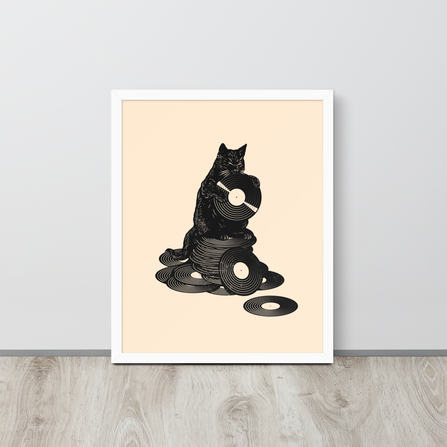 This design features a black cat cozily perched atop a stack of vinyl records, clutching one like it’s pure gold. It’s a tribute to analog lovers, feline charm, and the timeless joy of spinning a record. Perfect for music collectors, cat enthusiasts, and anyone with a nostalgic soul.