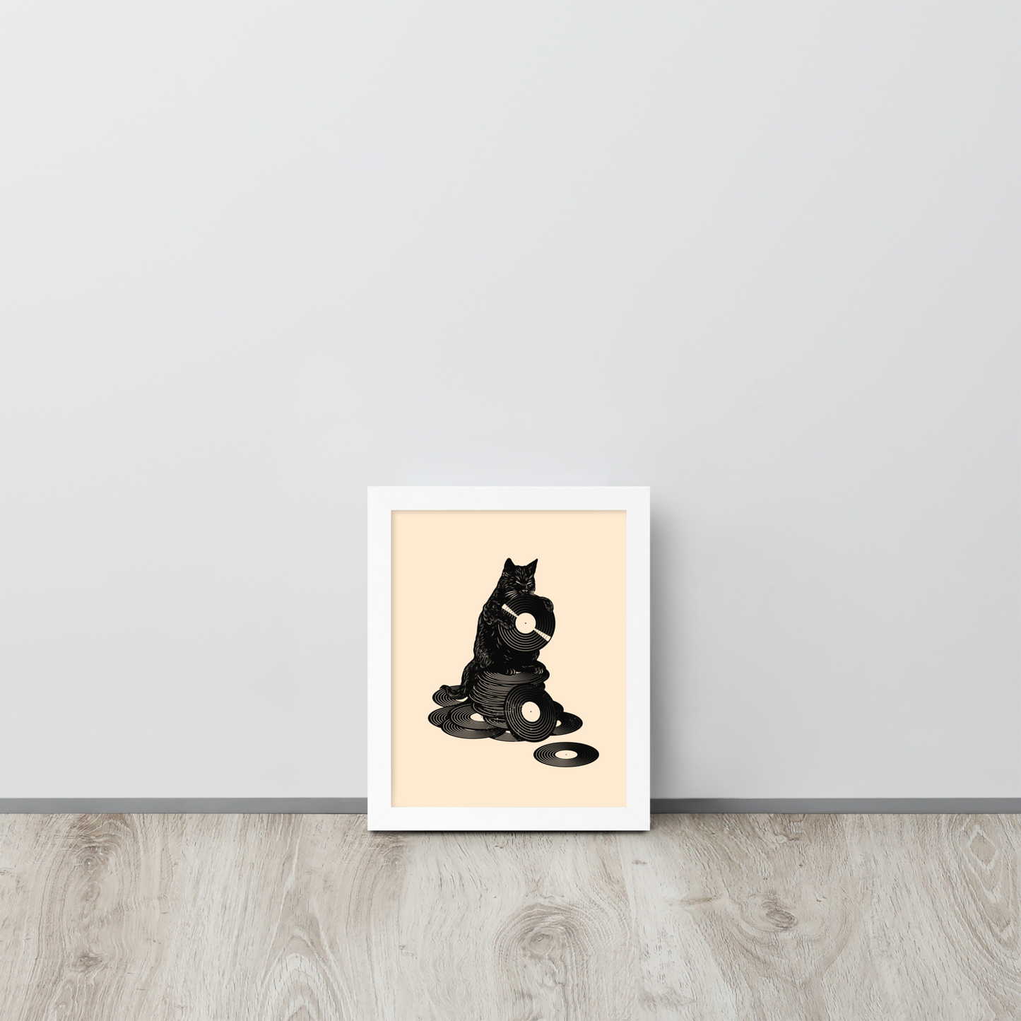 This design features a black cat cozily perched atop a stack of vinyl records, clutching one like it’s pure gold. It’s a tribute to analog lovers, feline charm, and the timeless joy of spinning a record. Perfect for music collectors, cat enthusiasts, and anyone with a nostalgic soul.