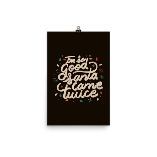 A lettering in a Christmas mood with Christmas lights on a black background with the phrase "I'm so Good Santa Came Twice". A fun art for anyone who loves Christmas gifts.
