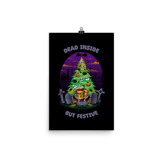 A quirky illustration features a Christmas tree decorated with skulls, pumpkins, and bats, set in a graveyard. The sky is purple and orange, with bats and tombstones surrounding the tree. A skeleton hand holds a festive gift box at the base. Above, text reads "Dead Inside" and below, "But Festive". The design combines Halloween and Christmas elements in a humorous style, highlighting a gothic and festive theme.