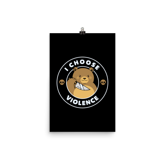 A cartoon-style image features a cute, determined-looking teddy bear holding a knife, with an expression of mischief. The bear is surrounded by the bold text 'I CHOOSE VIOLENCE' and accompanied by small skull icons on either side, adding a humorous and ironic twist to the design.
