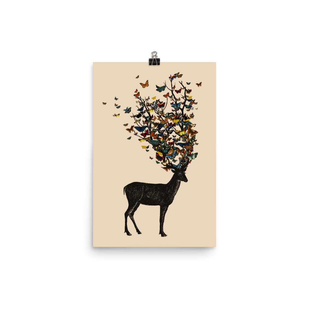 The image depicts a dark, silhouetted deer standing on a neutral background. Instead of branches, its antlers transform into a swirling cloud of vibrant, colorful butterflies that extend upwards and outward. The mix of organic and ethereal elements creates a captivating and whimsical visual contrast.