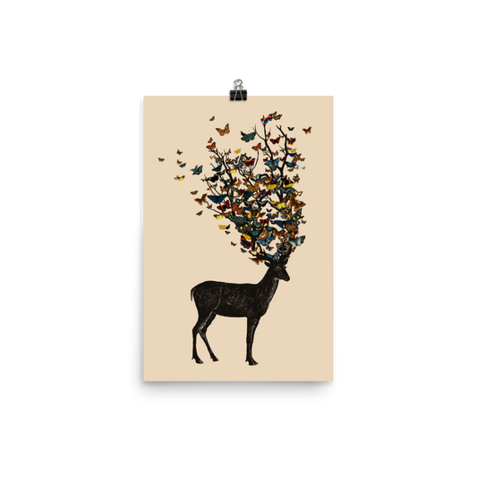 The image depicts a dark, silhouetted deer standing on a neutral background. Instead of branches, its antlers transform into a swirling cloud of vibrant, colorful butterflies that extend upwards and outward. The mix of organic and ethereal elements creates a captivating and whimsical visual contrast.