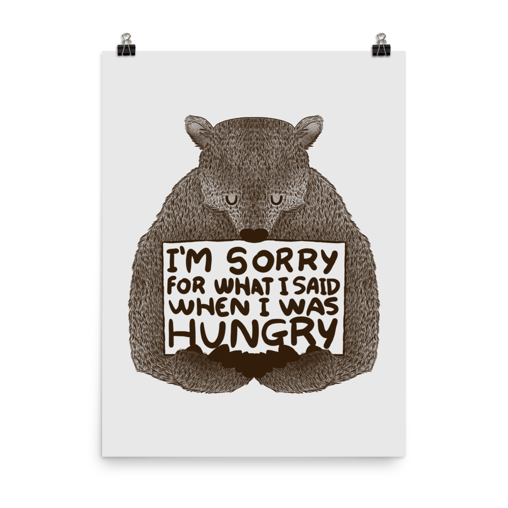 The image shows a humorous, detailed illustration of a bear, drawn in a hand-drawn style, holding a sign that reads 'I'm sorry for what I said when I was hungry.' The bear appears to be apologizing in a comical, endearing manner, making it a relatable and light-hearted design.