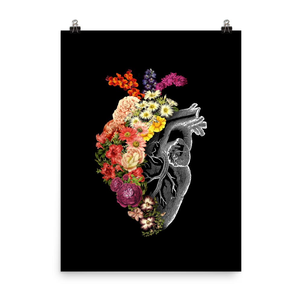 The design is an intricate and anatomical drawing of a human heart on a black background. The left side of the heart morphs into a vibrant assortment of colorful flowers, including roses, daisies, and other blooming blossoms, creating a striking contrast between the realistic and the surreal, symbolizing the harmony between nature and humanity.
